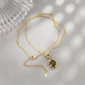 The three-piece set of gold-plated necklace, earrings and bracelet is an elegant wedding and party accessory for women.
